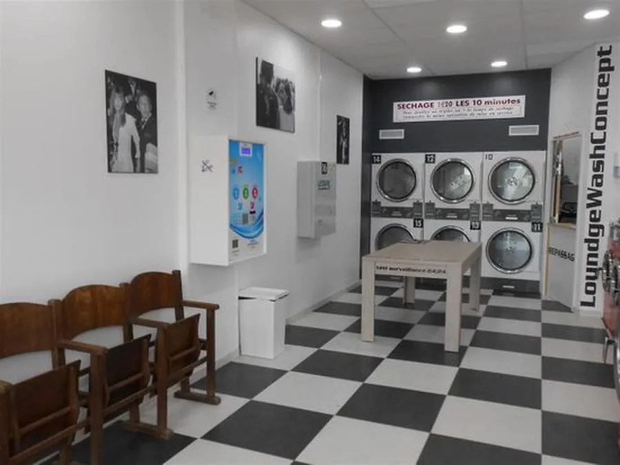 Laverie Beaulieu / Puilboreau — intérieur avec machines à laver et sèche-linge